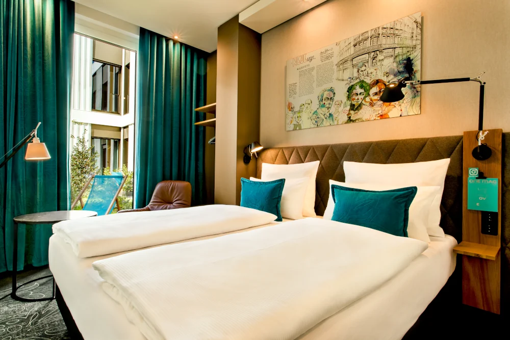 Zimmer The One mit Terrasse im Motel One München Messe